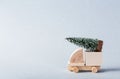 Miniature wooden truck with x-mas tree on is top Royalty Free Stock Photo