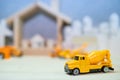 Miniature yellow concrete mixer truck model