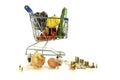 miniatures see the shopping cart filled with fruits isolated on transparent background Royalty Free Stock Photo