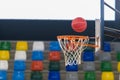 Detail of a basketball about to enter the basket Royalty Free Stock Photo