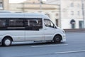 minibus goes on the city street Royalty Free Stock Photo