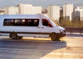 Minibus goes on the city street