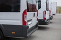 Minibuses in the parking lot at the bus stop