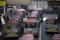 Minibuses waiting for passengers at a busy station in Mongkok, Hong Kong