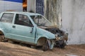 Minicar broken in accident is abandoned