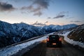 13/8/2019 A Minicooper Country man climbing to the top of snow hill in South island, New Zealand Royalty Free Stock Photo