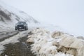 14/8/2019 A Mini cooper Country man climbing to the top of snow hill in South island, New Zealand Royalty Free Stock Photo