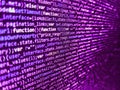 Minificated web development javascript code close up in sunset rays. HTML and CSS code developing screenshot. Data bits computer Royalty Free Stock Photo