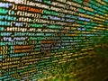 Minificated web development javascript code close up in sunset rays. Modern web development background. Abstract technological Royalty Free Stock Photo