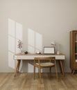 Minimal aesthetic home office interior with laptop mockup on wood table against the white wall Royalty Free Stock Photo