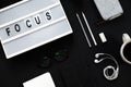 Minimal Black office table desk. Workspace with diary, plant, he Royalty Free Stock Photo