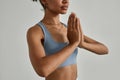 Close Up of Black Young Woman Meditating with Eyes Closed in Yoga Studio Royalty Free Stock Photo