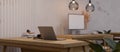 Minimal and comfortable office workspace interior design with laptop, computer on wooden table Royalty Free Stock Photo