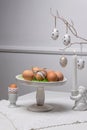 Minimal Easter Table Decor with Eggs, Branches and Candle Royalty Free Stock Photo