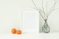 Minimal elegant mockup with tangerines and frame