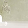 Minimal Empty Stone Counter Table Top, Plant And Candle, On Green Stucco Cement Wall For Luxury Organic Cosmetic, Skincare, Beauty