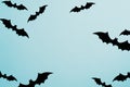 Minimal Halloween flat lay style composition with bats on blue background. Top view, view from above Royalty Free Stock Photo