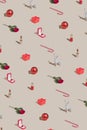 Minimal Holiday pattern made with makeup, Christmas decoration, gift box and roses. Vintage aesthetic style. Creative 2022 New Royalty Free Stock Photo