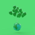 Minimal idea concept. Floating earth with green balloons