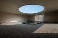 Skylit Circular Pool with Stone Ring and Vertical Slatted Light in Minimal Interior Royalty Free Stock Photo
