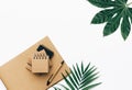 Minimal Office desk table with stationery set, supplies and palm leaves. Royalty Free Stock Photo