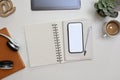 Minimal office desk workspace top view with smartphone mockup, stationery and decor