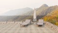 Minimal outdoor lounging terrace and sofa bench with mountain view , 3D illustration rendering