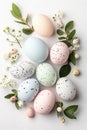 Minimal pastel Easter eggs flat lay with spring leaves Royalty Free Stock Photo