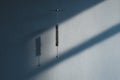 Minimal Pendulum On Blue Wall Balance Concept Royalty Free Stock Photo