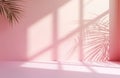Minimal pink studio interior with soft light and shadow patterns from palm leaves and window. Empty clean space for product Royalty Free Stock Photo