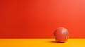 Minimal Retouching: Red Ball On Contrasting Orange Background Royalty Free Stock Photo