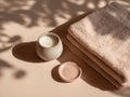 Minimal spa composition with towels and candle Royalty Free Stock Photo