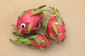 Minimal still life photography. Three dragonfruits with doll`s eyes