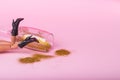 Minimal  trendy composition made of  female doll laying on the floor with trendy high heel boots and spilled champagne glass full Royalty Free Stock Photo