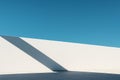 Minimal White Wall with Long Shadow and Blue Sky Royalty Free Stock Photo