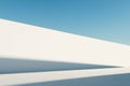 Minimal White Wall with Long Shadow and Blue Sky Background Royalty Free Stock Photo