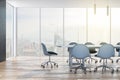 Minimal wooden and concrete meeting room interior with panoramic city view, daylight and large table with chairs. Corporate design Royalty Free Stock Photo