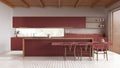 Minimal wooden kitchen with island in white and red tones. Resin floor and wooden ceiling. Cabinets, dining table and decors. Royalty Free Stock Photo