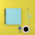 Minimal work space : top view of blue sketchbook , a cup of coffee ,flower , rubber and blue pastel pencil on yellow pastel back Royalty Free Stock Photo