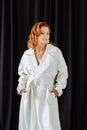 A woman in white coat
