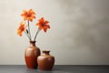 minimalism photo two modern terracotta vases with orange flowers on a table with copy space