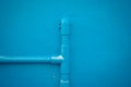 Minimalism style, Blue water tube on the wall. Royalty Free Stock Photo