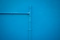 Minimalism style, Blue water tube on the wall. Royalty Free Stock Photo