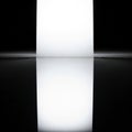 The white rectangle reflecting on a glossy, black surface below, suggesting Royalty Free Stock Photo