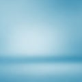A minimalist abstract image featuring a gradient of blue tones. The scene has a smooth Royalty Free Stock Photo
