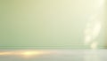 Minimalist abstract light background for product presentation in green tones. Soft natural shadow from the window on empty wall Royalty Free Stock Photo