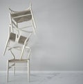 Minimalist architect designer concept with three classic wooden chairs hanging in the balance on white background and marble floor