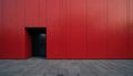 Minimalist architecture red wall with geometric angular entrance. Large imposing building facade shows stark contrast, modern