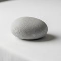 Minimalist background emphasizes the stone, suggesting a focus on Royalty Free Stock Photo
