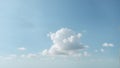 Minimalist background with a tranquil, pale blue sky and a solitary, wispy cloud. Royalty Free Stock Photo